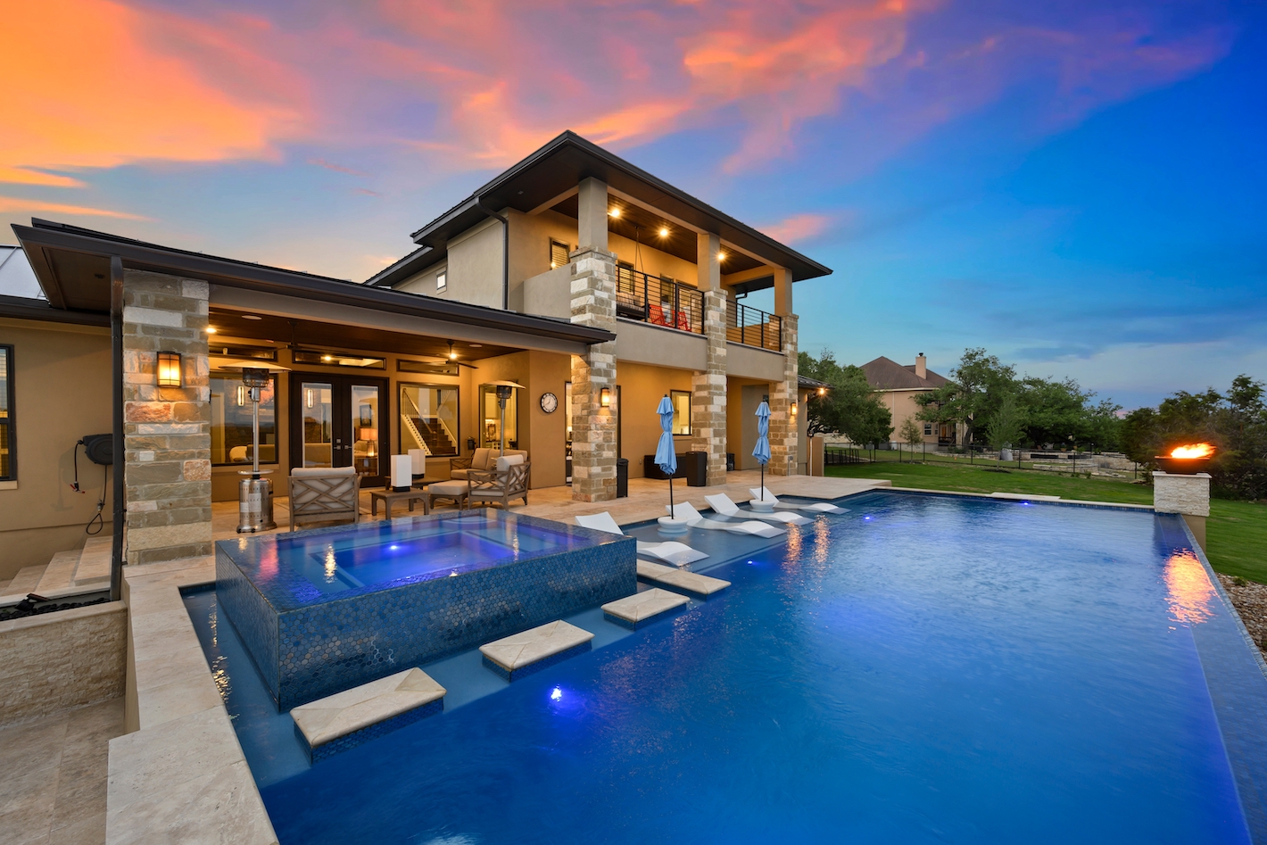 A Luxury Home with Pool At Sunset